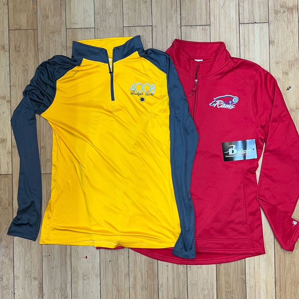 Two women’s badger sport performance, athletic quarter zip shirts, size medium